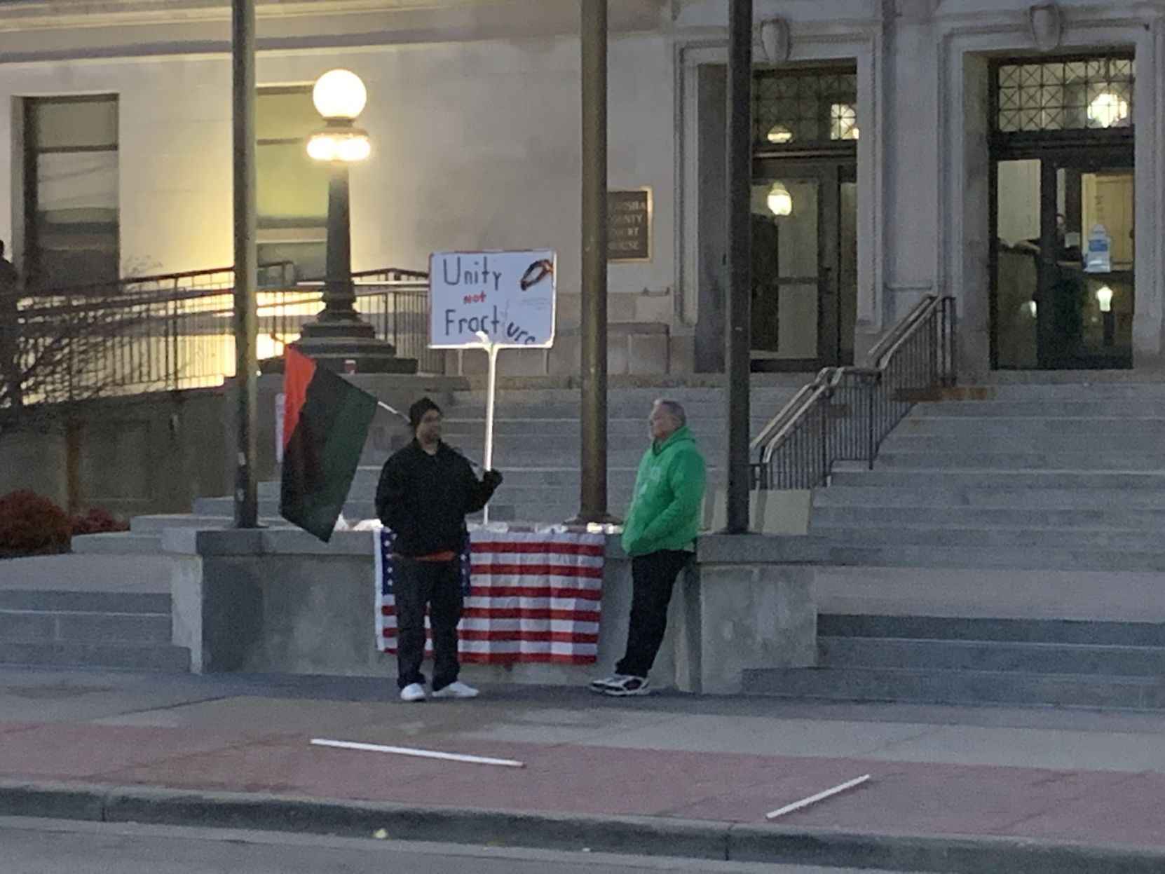 Just a handful of people left outside court house